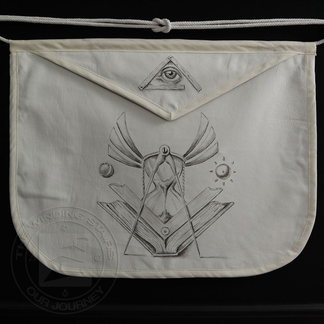 Hand-painted Masonic apron featuring the Winged Hourglass, Sun and Moon, Square and Compasses, and All-Seeing Eye from “Light of Time” by Juan Sepúlveda.