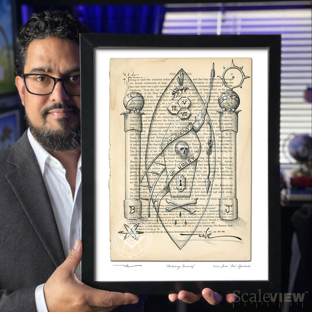 Masonic Artist in his studio holding artwork to showcase real world scale of 12" x 16" frame